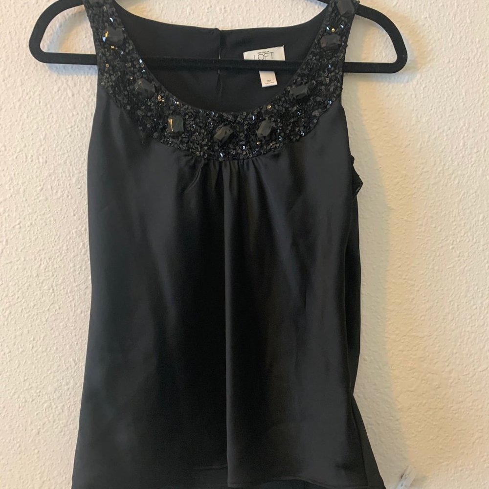 Black tank with stones